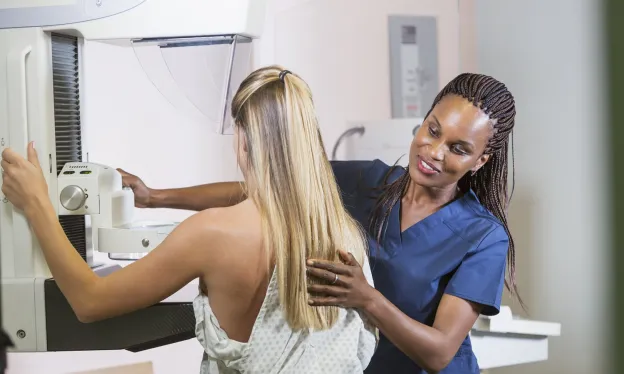 Mammographer Positioning Patient - MTMI