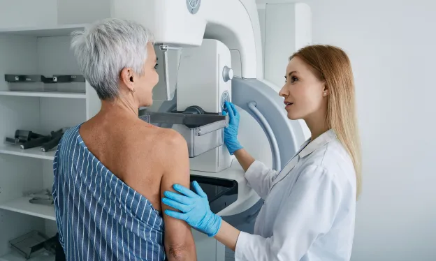 Senior Woman Having Mammogram Procedure - MTMI